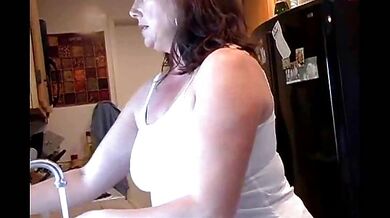 Hairy fat milf cock teases with her jugs in kitchen