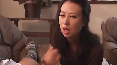 Sexy Asian milf admires and rides his big stiff dick