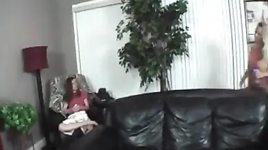 One stunning milf fucks her young step-son on her couch