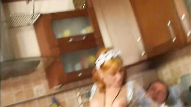 Mature maid and her kinky boss bang in the kitchen