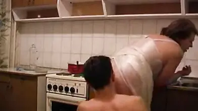 Kinky fat mature gal and young guy bang in kitchen