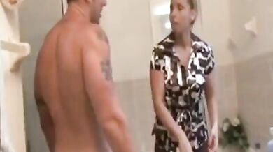 Attractive milf Stacie Starr blows young ramrod in the bathroom