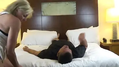 Mature blonde gradually strips while sitting on some dude's face