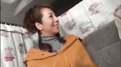 Mature Japanese redhead masturbates while having her big tits groped