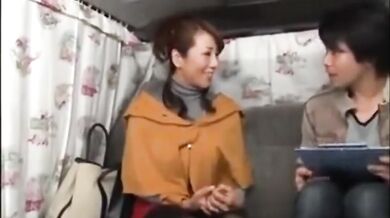 Mature Japanese redhead masturbates while having her big tits groped