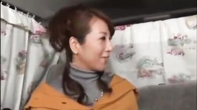 Mature Japanese redhead masturbates while having her big tits groped