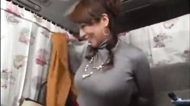 Mature Japanese redhead masturbates while having her big tits groped