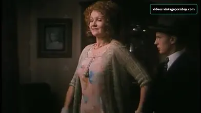 Vintage scene of the gorgeous mom seducing a young dude