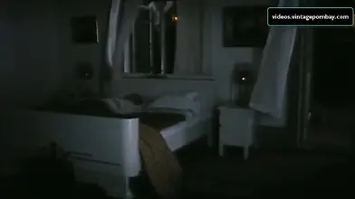 Vintage scene of the gorgeous mom seducing a young dude