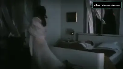 Vintage scene of the gorgeous mom seducing a young dude