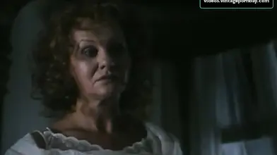 Vintage scene of the gorgeous mom seducing a young dude