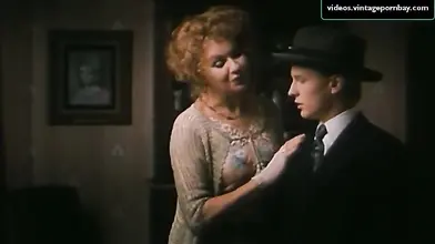 Vintage scene of the gorgeous mom seducing a young dude