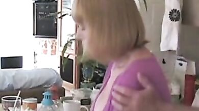 Captivating blonde mature gets if doggy style in her kitchen