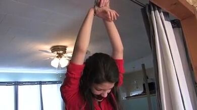 Slim Milf in high heeled leather boots enjoys self bondage