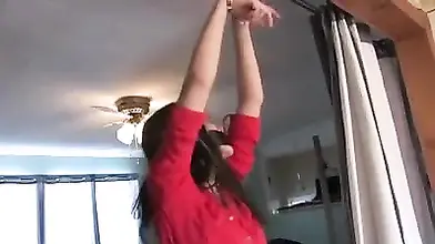 Slim Milf in high heeled leather boots enjoys self bondage