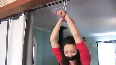 Slim Milf in high heeled leather boots enjoys self bondage