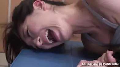 Restrained Japanese mom endures rough fingering on the massage table