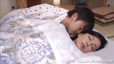 Pijama wearing freak plows big booty Japanese milf in bed