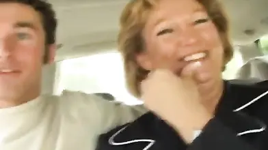 Hot cougar MILF bangs with a young guy in car