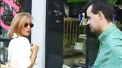 Fully clothed mature gal has fun with her boy toy