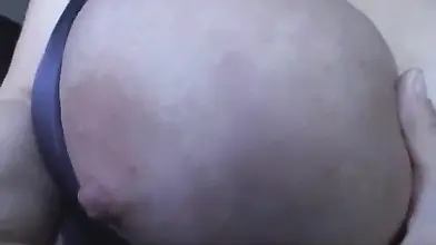 Handsome French MILF shows off her big juicy tits solo