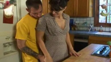 Lusty MILF eats a hard young cock in the kitchen