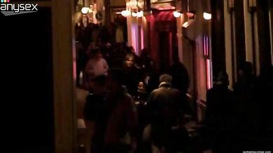 Trashy mature prostitute in fishnet stockings offers her sexual services