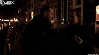 Trashy mature prostitute in fishnet stockings offers her sexual services