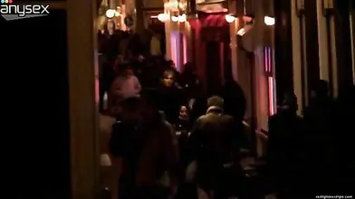 Trashy mature prostitute in fishnet stockings offers her sexual services