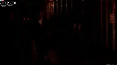 Trashy mature prostitute in fishnet stockings offers her sexual services