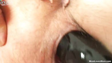 Fat mature lesbians enjoy toying each other's hairy fuck holes