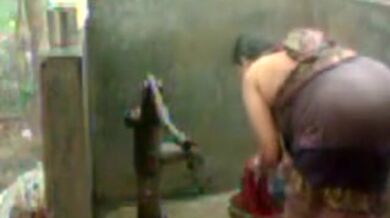 big beautiful woman indian bhabhi taking shower from pump