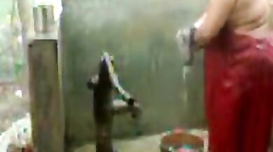 big beautiful woman indian bhabhi taking shower from pump