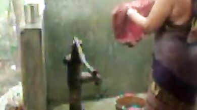 big beautiful woman indian bhabhi taking shower from pump