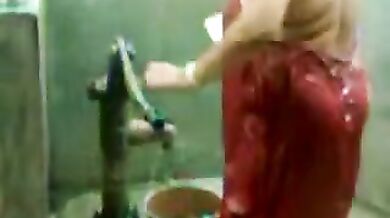 big beautiful woman indian bhabhi taking shower from pump