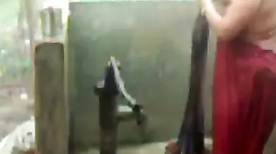 big beautiful woman indian bhabhi taking shower from pump