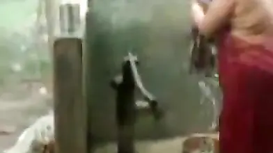 big beautiful woman indian bhabhi taking shower from pump