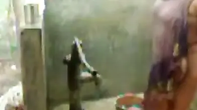 big beautiful woman indian bhabhi taking shower from pump