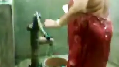 big beautiful woman indian bhabhi taking shower from pump