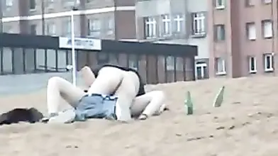 Couple having sex on the beach