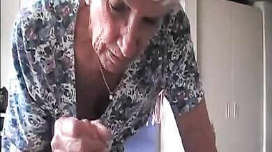 Mature Lady Enjoys a Milky Treat