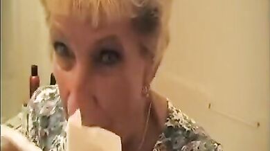Mature Lady Enjoys a Milky Treat