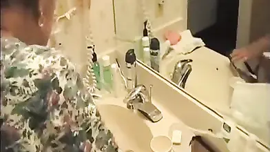 Mature Lady Enjoys a Milky Treat