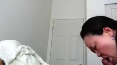 Asian Mature Gives Post-Massage Blowjob