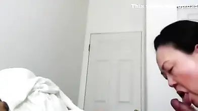 Asian Mature Gives Post-Massage Blowjob