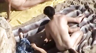 Mature Couples' Beach Encounter