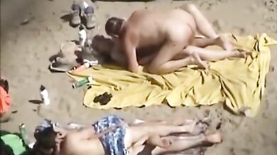 Mature Couples' Beach Encounter