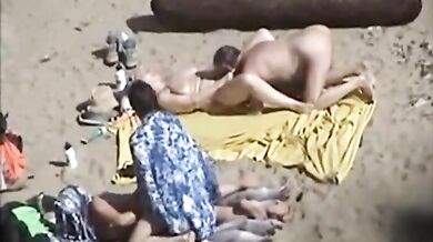 Mature Couples' Beach Encounter