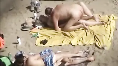 Mature Couples' Beach Encounter