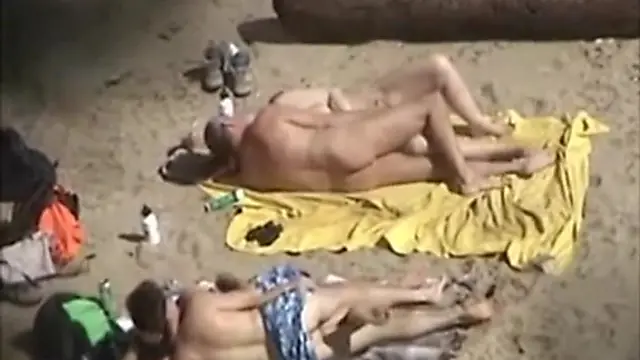 Mature Couples' Beach Encounter